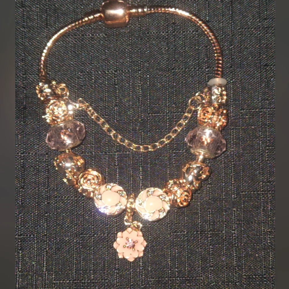 Elegant Rose Gold Bracelet with Pink Accents. ITEM No. 19-145